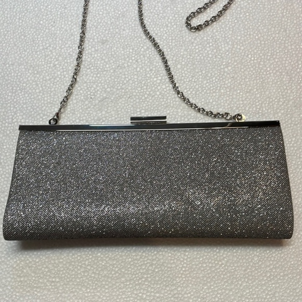 Silver sparkle woman’s handbag.
